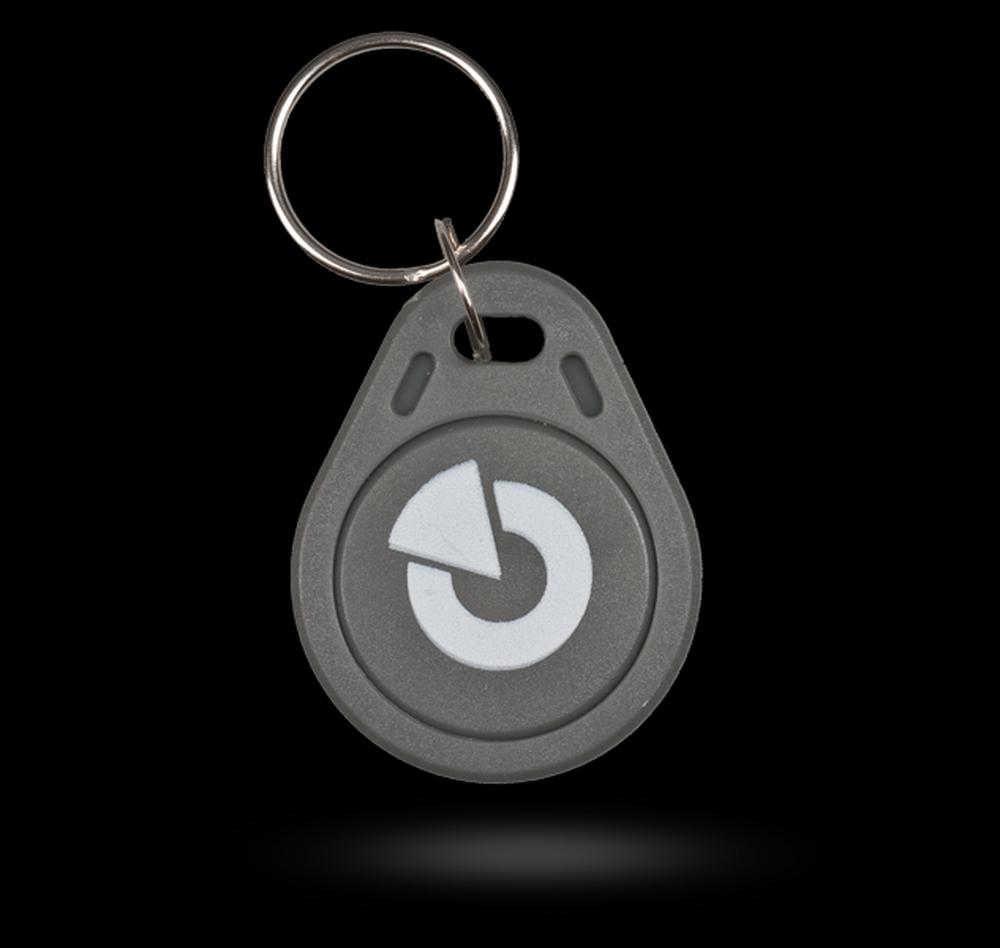 Bezdotykový RFID přívěsek JA-191J stojí 70 Kč a je základním řešením pro ty, kteří chtějí systém bez čísleného PIN.