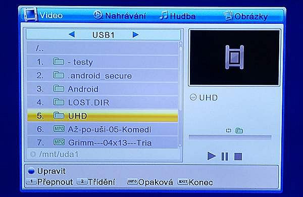 V souborovém manažeru se pohybujete šipkovými tlačítky, OK spustí přehrávání, Pause ho zastaví. V tomto okamžiku můžete pomocí šipkových tlačítek přeskakovat na libovolnou pozici (jedno zmáčknutí cca minuta).